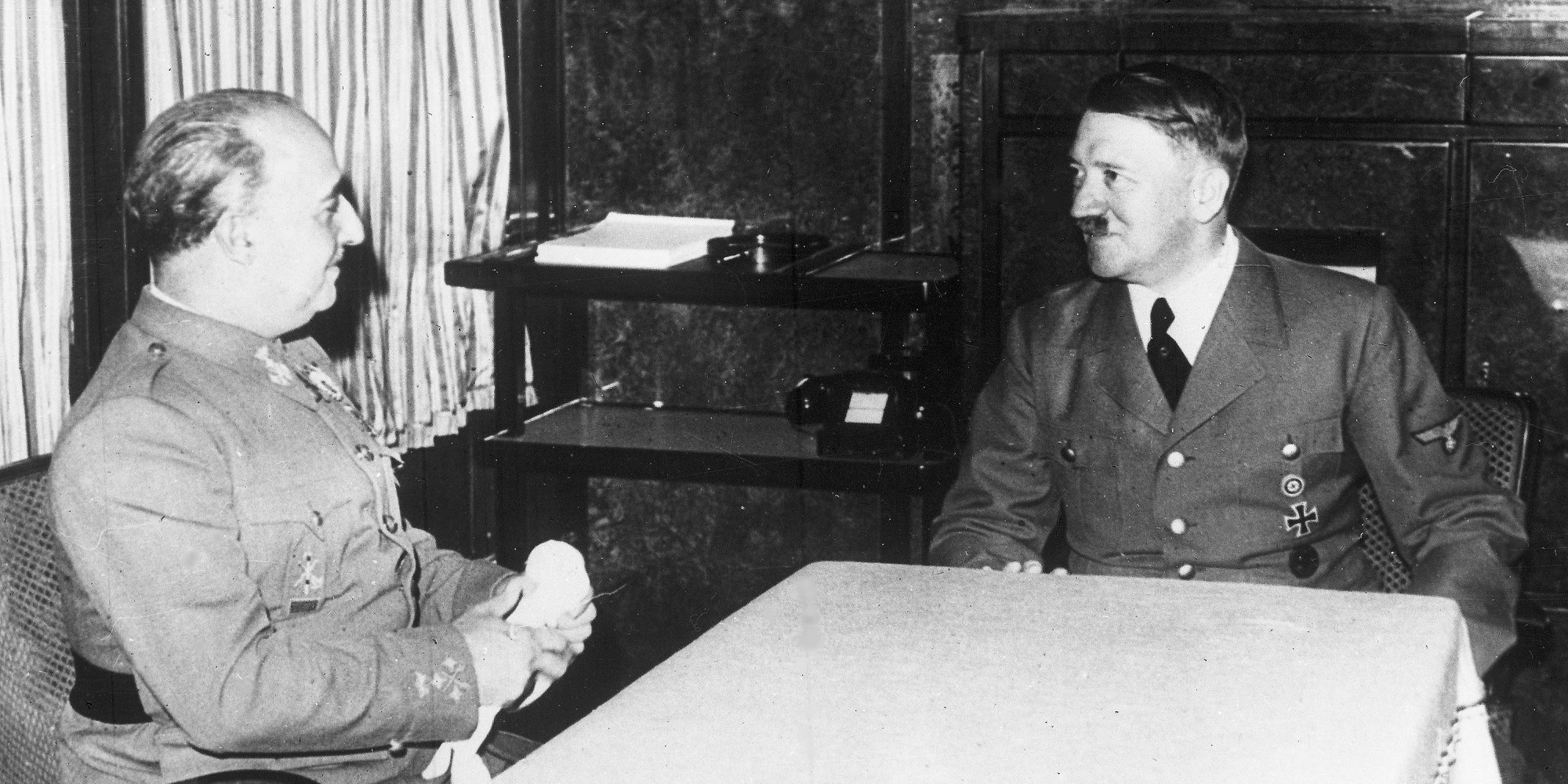 German Chancellor Adolf Hitler, right, talks with Spain's Generalissimo Franco, in Hendaye, France, Oct. 23, 1940, in Hitlers railway carriage during his trip to France, Spain and Italy. (AP Photo)
